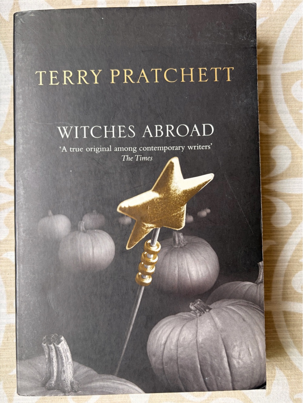 Witches Abroad Paperback Book with Gold Star Accent